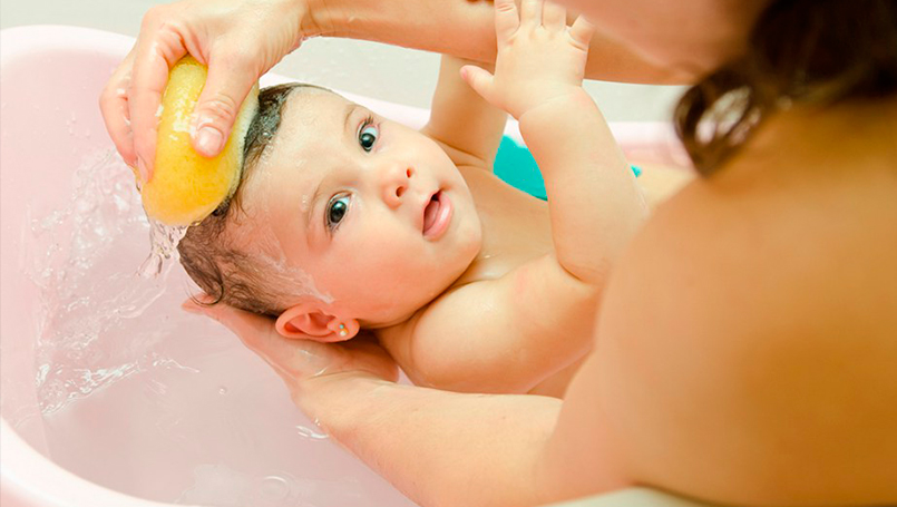 giving baby a sponge bath